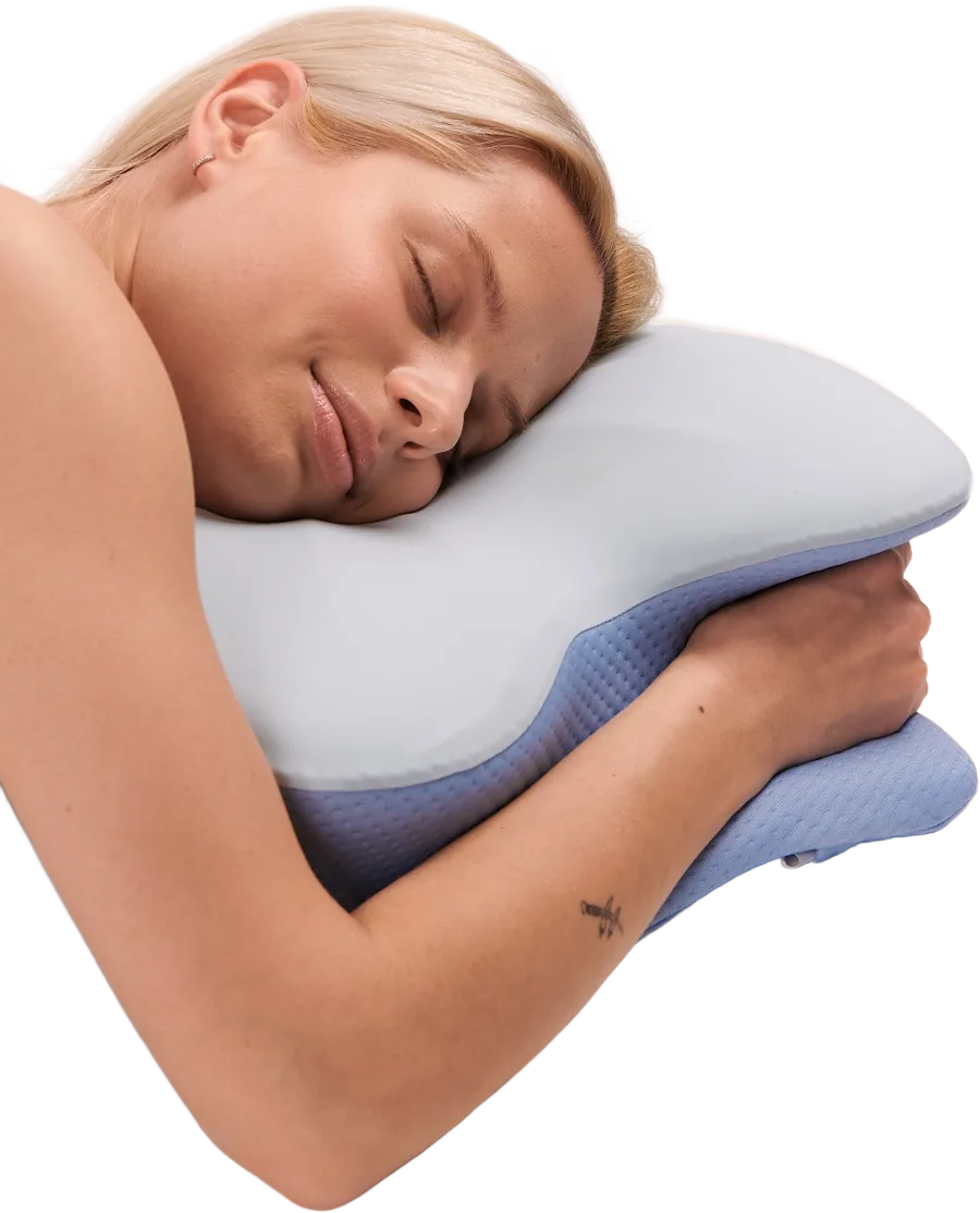 Woman hugging the butterfly-shaped pillow
